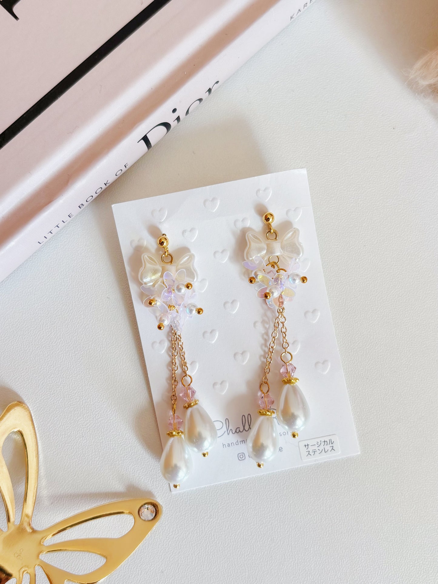 蝴蝶結透亮珍珠耳環