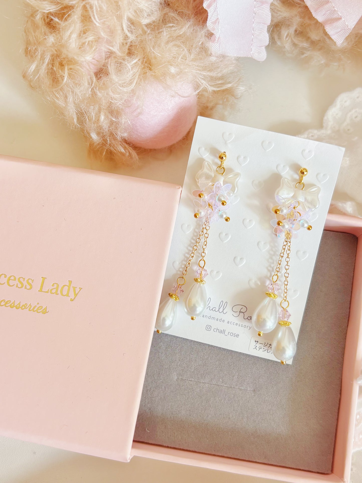 蝴蝶結透亮珍珠耳環